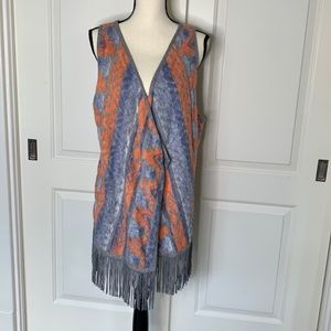 NWOT Women’s orange/blue/and gray vest with leather fringe trim